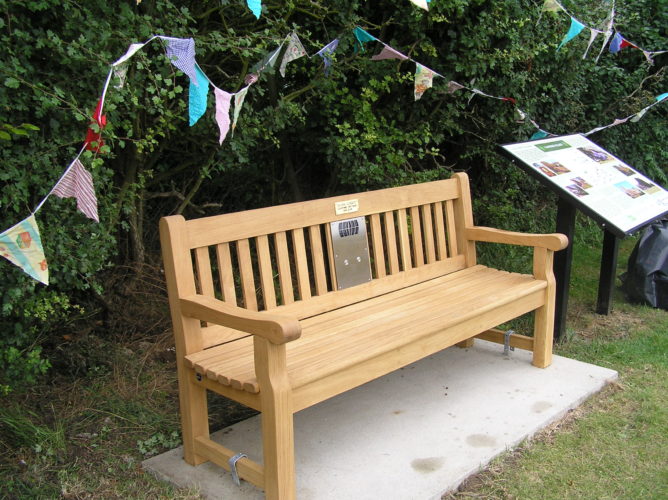 Photograph of listening bench installed on Blacksmith's Corner